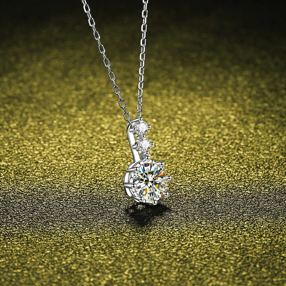 Side view of the 925 silver pendant necklace featuring a 1 carat moissanite, highlighting the delicate chain and pendant details.