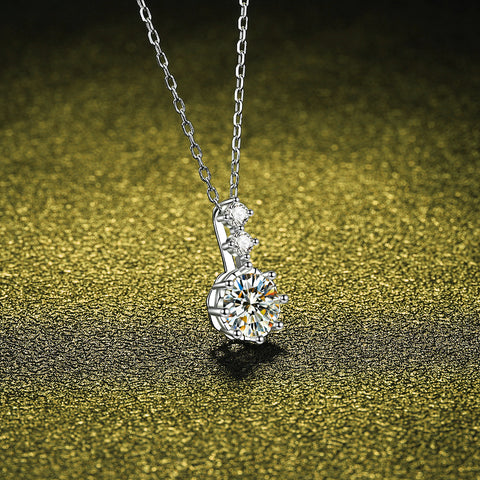 Side view of the 925 silver pendant necklace featuring a 1 carat moissanite, highlighting the delicate chain and pendant details.