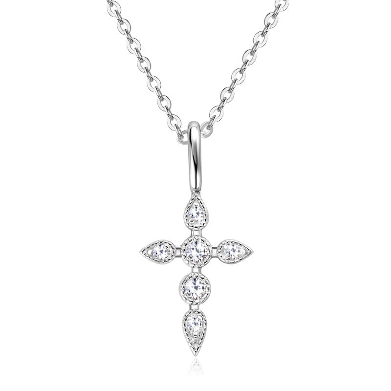 The 925 silver 14K gold moissanite 3D cross necklace displayed on a white background, highlighting its exquisite design and luxurious appeal