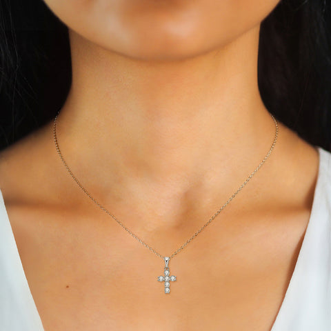 Model wearing the 925 Silver 14K Gold Moissanite Cross Necklace, demonstrating its elegance and style in a real-life setting.