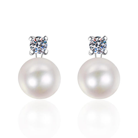 925 silver inlaid moissanite with natural pearl stud earrings displayed on a white background, emphasizing their exquisite design and noble aesthetic.
