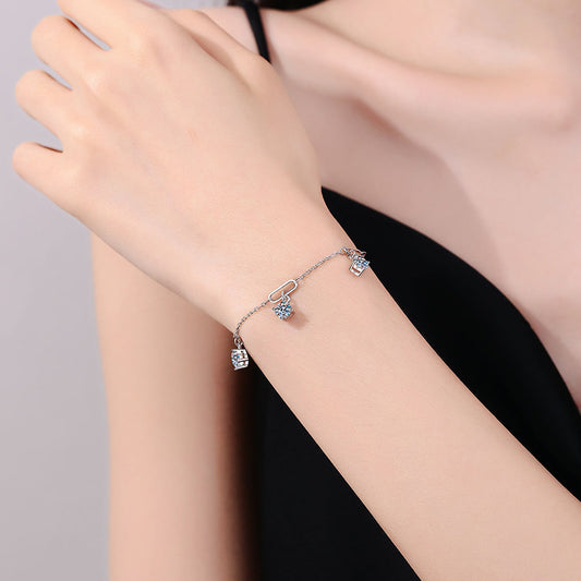 Model wearing the 925 silver 1.5 carat moissanite pendant bracelet, illustrating its elegant look in real life. 