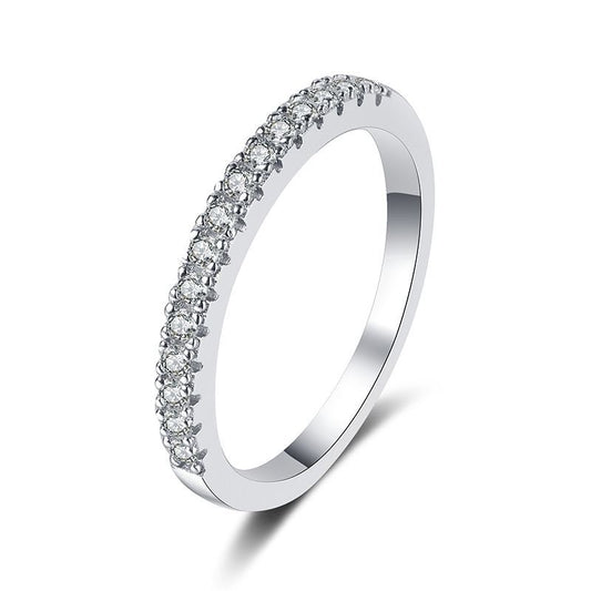 925 silver single row moissanite ring displayed on a white background, providing a clear view of its design and radiant sparkle.