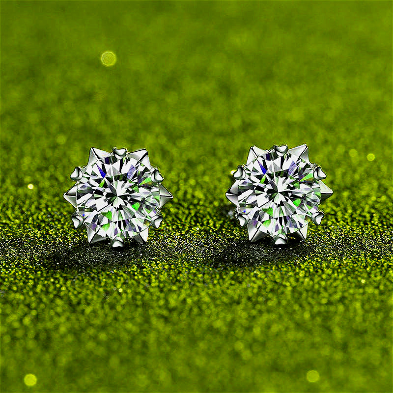  Front view of 925 silver snowflake moissanite stud earrings, showcasing their intricate snowflake design and sparkling moissanite.
