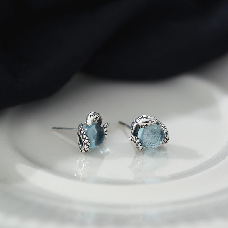 925 Sterling Silver Serpent Pearl Zircon Stud Earrings showcasing a round 6mm zircon stone in an elegant design.  