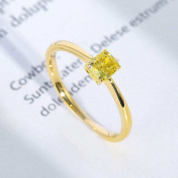 A side view of the 925 silver yellow zircon ring, emphasizing its intricate details and smooth finish.