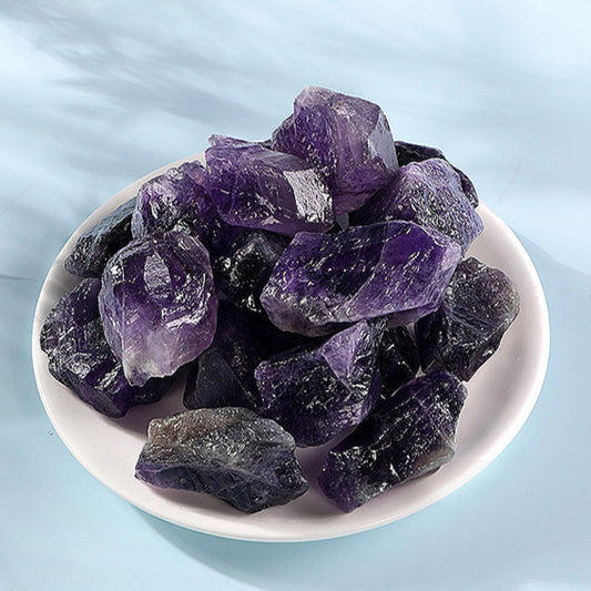  Front view of the Natural Amethyst Rough Stone, showcasing its vibrant purple color and unique natural texture, ideal for spiritual healing and energy enhancement.
