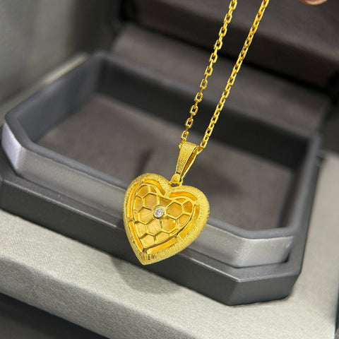 Back view of the 925 silver gold-plated heart pendant necklace with a smooth, brushed finish.