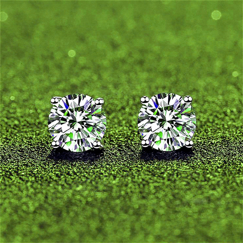 Front view of Classic 925 Sterling Silver Four-Claw Moissanite Stud Earrings, showcasing their simple yet generous design with sparkling moissanite stones that shine forever