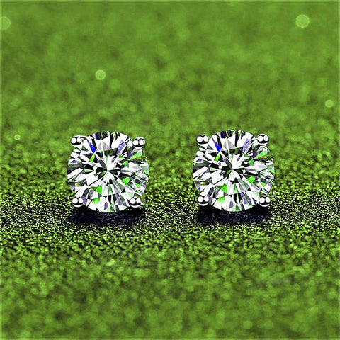 Front view of Classic 925 Sterling Silver Four-Claw Moissanite Stud Earrings, showcasing their simple yet generous design with sparkling moissanite stones that shine forever