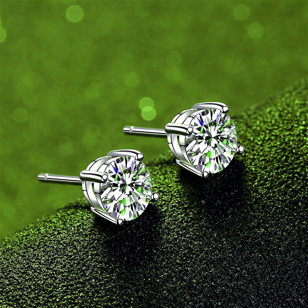 Side view of Classic 925 Sterling Silver Four-Claw Moissanite Stud Earrings, highlighting the secure four-claw setting that enhances the brilliance of the moissanite