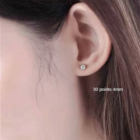 Model wearing Classic 925 Sterling Silver Four-Claw Moissanite Stud Earrings, illustrating their timeless elegance and how they effortlessly complement any outfit