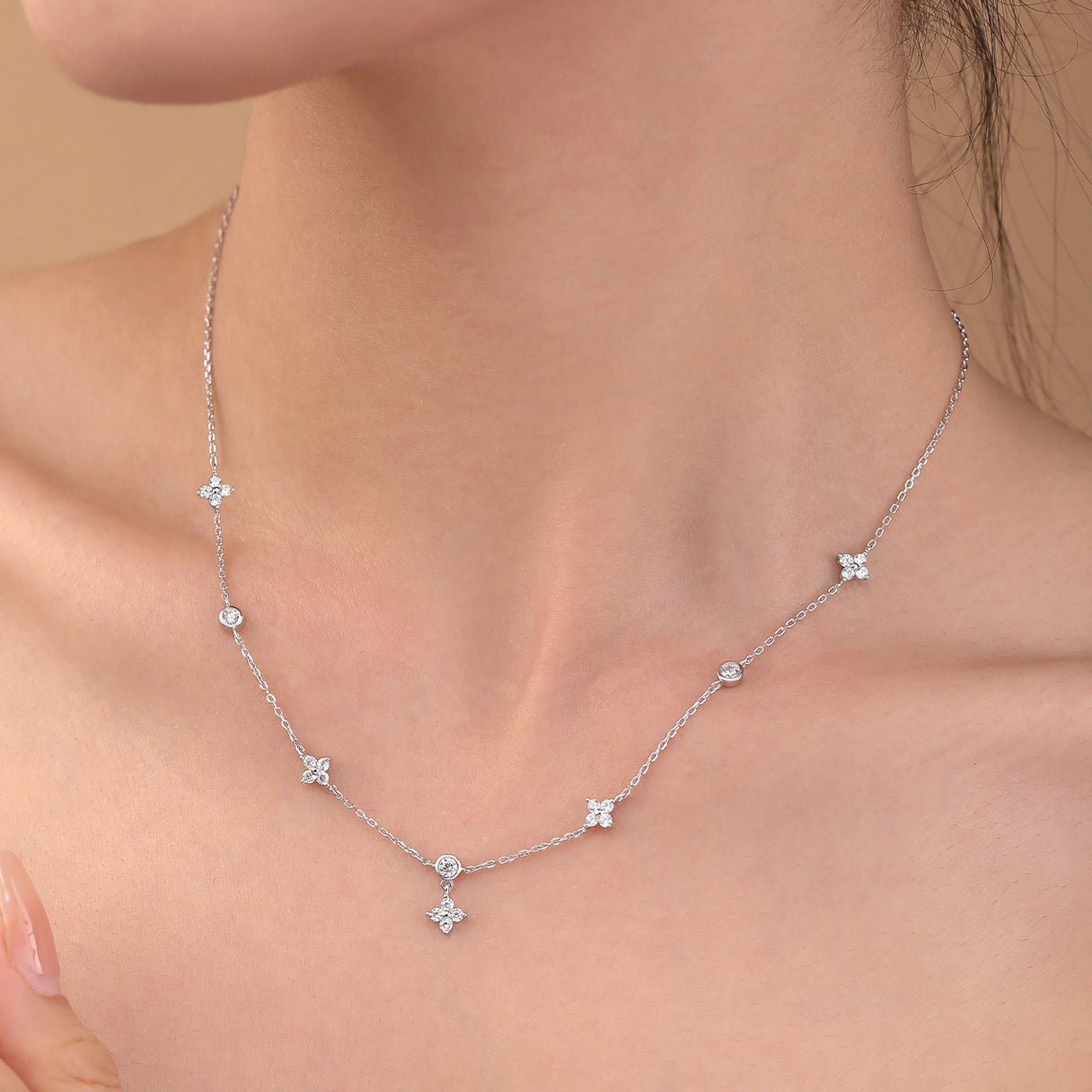 Model wearing the Exquisite 925 Silver Four-Leaf Clover Zircon Necklace, illustrating its elegance and how it complements various outfits with a touch of luck