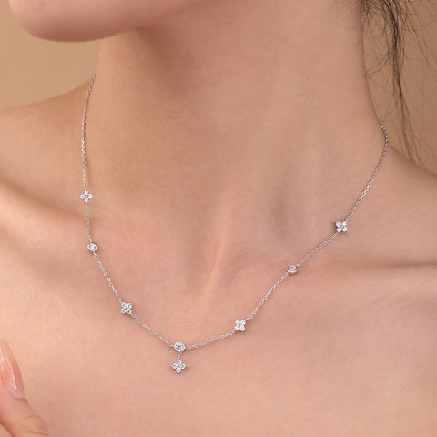 Model wearing the Exquisite 925 Silver Four-Leaf Clover Zircon Necklace, illustrating its elegance and how it complements various outfits with a touch of luck