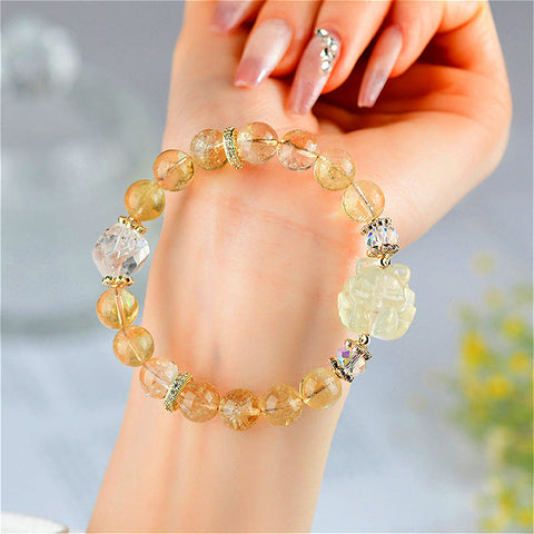  Natural Citrine and White Crystal Nine-tailed Fox Bracelet worn on a wrist, demonstrating its elegant design and fit.