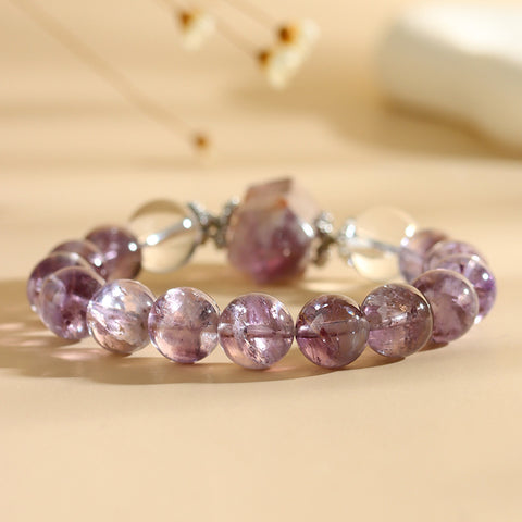 Side view of the natural purple Asai crystal, white crystal, and purple ghost crystal bracelet, highlighting its elegant design and bead arrangement