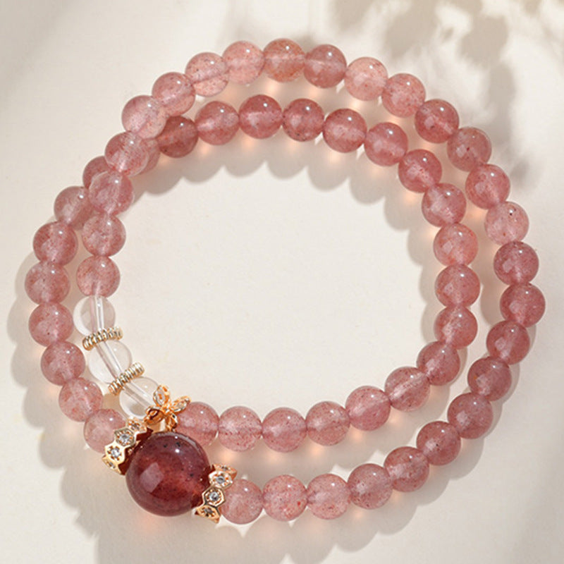 Front view of the Peach Pink Natural Strawberry Crystal, White Crystal, and Garnet Double Bracelet, showcasing its vibrant colors and elegant design.